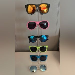 7 pairs of Babiator sunglasses sizes ages 3-5